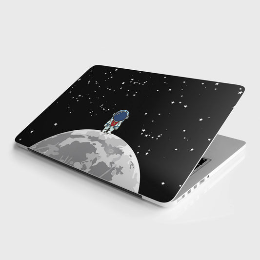 Astronaut on moon laptop skin